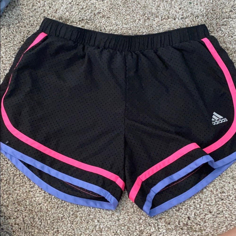 Black,pink and purple Adidas shorts.